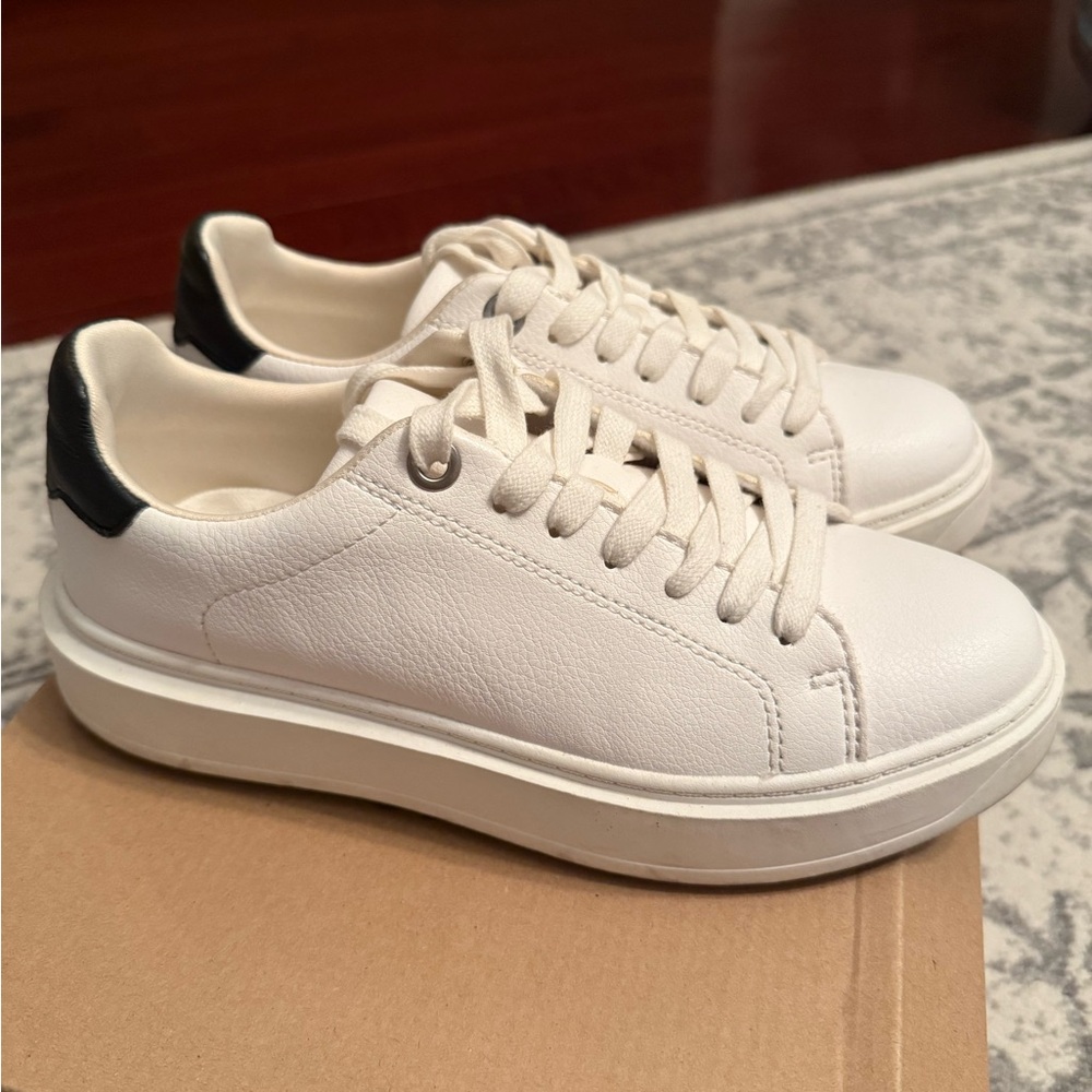 White and black Steve Madden sneakers